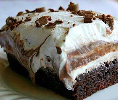 BROWNIE REFRIGERATOR CAKE

**Be sure to save this by clicking "SHARE" so You will be able to find it on your own timeline later!**

Ingredients:
1 box brownie mix
1 extra large egg
1 (8 oz.) package cream cheese, softened
1 cup powdered sugar
2 (8 oz.) containers whipped topping
1 (3 oz.) package instant chocolate pudding
1 (3 oz.) package instant vanilla pudding
3 1/2 cups milk
1 Hershey candy bar or chocolate syrup

Directions: Mix brownie mixes according to directions. Add egg. Bake in brownie pan. Mix cream cheese, powdered sugar and 1 container whipped topping. Put this mix on top of the cooled brownies. Blend puddings and milk together and put on top of the cream cheese mixture. Top with another layer of whipped topping. Put chocolate shavings or chocolate syrup on top. Refrigerate until ready to serve