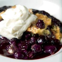 Blueberry Dump Cake ~
http://farmflavor.com/blueberry-dump-cake/

Ingredients

4 cups frozen blueberries
1/2 cup sugar
1 (18.25-ounce) box yellow cake mix
3/4 cup (6 ounces or 1 1/2 sticks) butter
whipped cream or vanilla ice cream
 
 
Tips & Notes
Fresh blueberries will work for this recipe; however, add a bit more sugar because fresh blueberries aren’t always very sweet. You can also try this recipe with fresh or frozen blackberries, strawberries or raspberries – or all three!
 
 
Instructions

Preheat oven to 350 degrees.
Dump blueberries and sugar into 9-by-13-inch baking dish. Stir together.
Sprinkle cake mix over the fruit. Slice butter and distribute over the surface of the cake mix.
Bake for 45 minutes to 1 hour (until cake is lightly golden brown and no batter comes out after a toothpick test).