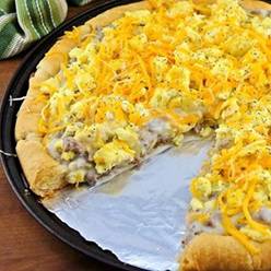Breakfast Pizza

Ingredients

2 packages crescent rolls
1 package Jimmy Dean cooked sausage crumbles
1 envelope country gravy mix
6 eggs
2 tablespoons milk
1/2 teaspoon salt
1/4 teaspoon pepper
1 tablespoon butter
8 oz shredded cheddar cheese
4 oz shredded pepper Jack cheese

Directions

1. Heat oven to 375. Separate crescent dough into 16 triangles and place on a greased, round pizza pan with points toward the center. Press onto the bottom and up the sides of pan to form a crust; seal seams. Bake for 11-13 minutes or until golden brown.

2. Meanwhile, prepare gravy according to package directions in a medium saucepan. Stir sausage crumbles into thickened gravy; set aside.

3. In a small bowl, whisk together the eggs, milk, salt and pepper. In a large skillet, heat butter over medium heat. Add egg mixture; cook and stir until almost set.

4. Spread sausage gravy mixture over the crust. Top with eggs and cheeses. Bake 5-10 minutes longer or until eggs are set and cheese is melted. Cut into wedges.