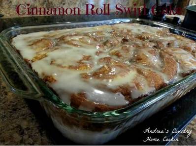 CINNAMON ROLL SWIRL CAKE

BATTER:
3 cup flour
1/4 tsp salt
1 cup sugar
4 tsp baking powder
1 1/2 cup milk
2 eggs
2 tsp vanilla
1/2 cup butter, melted

Topping:
1 cup butter, soft to the point of almost melted*
1 cup brown sugar
2 Tbsp flour
2 Tbsp cinnamon

Glaze:
2 cup powdered sugar
5 Tbsp milk
1 tsp vanilla

In a large bowl, mix all the ingredients together except for the butter.
Once mixed; slowly pour in the butter. Stir into batter.
Pour into a greased 9x13 pan. 
For the topping, mix all the ingredients together until well combined.
Drop evenly over the batter and swirl with a knife. 
Bake at 350 for 30-40 minutes.

While the cake is warm ~ drizzle the glaze over the cake. *This cake is outta this world!!!!!!*