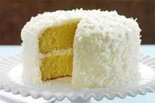 COCONUT CREAM CAKE
 
A faithful standby of creamy coconut joy that's even better if made the day before serving! It can also be made in a 9x13x2-inch pan and can be stored in the freezer for up to a month. 

1 box yellow cake mix 
Eggs, water and oil for cake mix 
1 box small coconut cream pudding mix (not instant), divided in half

FROSTING: 
1 (8 oz.) pkg. cream cheese, room temp. 
1/2 cup powdered sugar 
1/2 box small coconut cream pudding mix (not instant), 
remaining half 
1/4 cup milk 
1 Tbsp. lemon juice 
1 tsp. coconut flavoring 
1 tsp. vanilla extract 
1 pinch salt (tiny pinch) 
1 (12 oz.) tub Cool Whip, thawed 
1 cup shredded coconut (for between layers) 
2 cups shredded coconut (for coating outside of cake) 

Add eggs, water and oil to cake mix according to package directions along with 1/2 package of dry pudding mix (reserve other half for frosting). Bake into 2 8-inch layers; cool.

Prepare frosting by combining cream cheese, sugar, remaining 1/2 package of dry pudding mix, milk, lemon juice, coconut flavoring, vanilla extract and salt with an electric mixer until smooth. Gently fold in whipped topping with a spatula; chill until ready to frost cake. 

Spread a generous layer of frosting between layers and sprinkle with 1 cup of coconut. Frost cake and coat with coconut (pressing it onto the top and sides of cake). Store cake in refrigerator until serving time. 

For an extra special touch, cake layers may be split in half, spread with frosting and sprinkled with additional coconut. Cake may also be garnished with toasted coconut in addition to or in place of plain coconut.
 
Butter recipe or even chocolate cake mix may be substituted in place of yellow cake mix (prepare according to package directions).