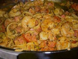 ***YUMMY ALERT: Cajun Shrimp & Sausage Pasta***
 ((SHARE this pic so it saves on your Timeline & you can find it later when you're ready to make it!))

Ingredients
1/2 - 3/4 lb cooked fettuccine
2 TBS olive oil
1 lb peeled, deveined raw large shrimp
1 TBS plus 2 tsp Essence seasoning (recipe below - I think you can buy this, too.)
1 1/2 hot linked or smoked turkey sausages, sliced and quartered (I use Butterball)
1/2 cup diced green pepper
1/2 cup diced yellow onion
1 TBS minced garlic
1/2 cup chicken stock
1 tsp dried thyme
1 tsp dried basil
1/2 cup heavy cream
1/2 cup grated Parmesan

Essence Creole Seasoning
2 1/2 tablespoons paprika
2 tablespoons salt
2 tablespoons garlic powder
1 tablespoon black pepper
1 tablespoon onion powder
1 tablespoon cayenne pepper
1 tablespoon dried oregano
1 tablespoon dried thyme

Directions
Heat 1 TBS of olive oil over medium high heat in a large saute pan. Season the shrimp with 2 teaspoons of the Essence. Place the shrimp in the pan and saute until almost done. Remove the shrimp from the pan and set aside.

Place the remaining TBS of olive oil in the saute pan and onions and bell peppers. Saute, stirring occasionally, until the onions are translucent, about 3 minutes. Add the sausage and cook another minute.

Add the garlic to the pan and saute for 30 seconds.

Add the chicken stock to the pan and scrape with a spoon to remove any browned bits that have formed in the bottom of the pan, about 30 seconds.

Add the thyme, 1 TBS of Essence and 1/2 tsp salt and cook for 2 minutes.

Add the heavy cream to the pan and cook an additional 2 minutes.

Return the shrimp to the pan and pasta to the pan. Continue to cook the sauce and pasta, stirring occasionally, for about 3-5 minutes. Remove from the heat and add the basil and Parmesan.

_____________________________________________________________

Feel free to send me a FRIEND REQUEST; I am always posting awesome stuff on my timeline too!

SHARE this pic so it saves on your Timeline & you can find it later when you're ready to make it!

For more healthy recipes, tips, motivation, and fun, join us in our private FB weight management group>> @[199825776843351:69:Slim & Trim with TY]
