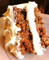 Canada's Best Carrot Cake with Cream Cheese Icing
Ingredients
2 cups (500 mL) all-purpose flour
2 tsp (10 mL) baking powder
2 tsp (10 mL) cinnamon
1 tsp (5 mL) baking soda
3/4 tsp (4 mL) salt
1/2 tsp (2 mL) nutmeg
3/4 cup (175 mL) granulated sugar
3/4 cup (175 mL) packed brown sugar
3 eggs
3/4 cup (175 mL) vegetable oil
1 tsp (5 mL) vanilla
2 cups (500 mL) grated carrots
1 cup (250 mL) drained crushed canned pineapple
1/2 cup (125 mL) chopped pecans

Icing:
1 8 oz (250g) package cream cheese, softened
1/4 cup (60 mL) butter, softened
1/2 tsp (2 mL) vanilla
1 cup (250 mL) icing sugar (aka confectioners sugar and powdered sugar)

Preparation
Grease and flour 13- x 9-inch (3.5 L) metal cake pan; (or 2 round pans) set aside.

In large bowl, whisk together flour, baking powder, cinnamon, baking soda, salt and nutmeg. In separate bowl, beat together granulated and brown sugars, eggs, oil and vanilla until smooth; pour over flour mixture and stir just until moistened. Stir in carrots, pineapple and pecans. Spread in prepared pan.

Bake in centre of 350°F (180°C) oven for 40 minutes or until cake tester inserted in centre comes out clean. Let cool in pan on rack. (Make-ahead: Cover with plastic wrap and store at room temperature for up to 2 days. Or ovenwrap with heavy duty foil and freeze for up to 2 weeks; let thaw before continuing.)

Icing: In bowl, beat cream cheese with butter until smooth. Beat in vanilla. Beat in icing sugar, one-third at a time, until smooth. Spread over top of cake. (Make-ahead: Cover loosely and refrigerate for up to I day.)
Source: Canadian Living magazine  http://on.fb.me/105vxRK