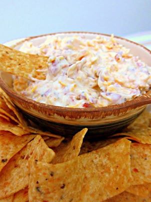 There is good reason this dip is called CRACK! It is so simple to make and it is VERY addictive to eat.  The FDA should require a warning label on this recipe!

Cheddar Bacon Dip (a.k.a Crack)

16 oz sour cream
1 packet Ranch dressing mix
3 oz bacon bits (in the bag not jar)
1 cup shredded cheddar cheese

Mix together and refrigerate 24 hours. Serve with chips and/or veggies.