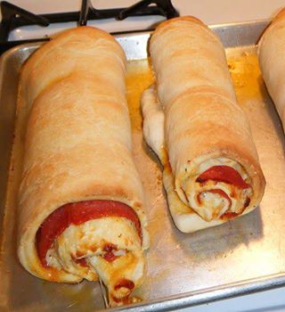 •Cheesy Pepperoni Twist Rolls Recipe!

I love bread and I love cheesy pepperoni pizza too, so thanks to pinterest, this was an amazing combination!

Now this one can be with as much or as little cheese and pepperoni as you want , its up to you, as long as the dough is covered its fine

Ingredients:
Frozen bread dough
Pepperoni
Mozzarella cheese
Parmesan cheese
Olive oil
Italian seasoning
1/4 cup tomato sauce (Optional)
8 slices bacon
1 small to medium onion if desired diced finely

Directions:
Loosely cover the frozen bread dough with plastic wrap. Allow the dough to thaw for a few hours at room temperature. When the dough is completely thawed it will be slightly puffed up.
Here's a tip: Spray the plastic wrap with cooking oil, or brush it with cooking oil and lay it, oiled side down on the bread dough. This allows the bread dough to rise and move easily under the plastic wrap without it sticking or holding back the dough.
cook and crumble bacon
Roll dough out to an approximately 11 x 11 inch square. One frozen dough log makes one pepperoni roll.

Brush dough with olive oil or whatever cooking oil you prefer. Lay pepperoni on the dough covering entire surface. Sprinkle with shredded mozzarella cheese.

Next, sprinkle it with shredded Parmesan cheese and lightly sprinkle it with Italian seasoning. Add a sprinkling of garlic salt (optional).and add crumbled bacon and finely diced onion if so desired.

Roll up the dough starting at one edge of the square.
Place rolls on baking sheet, leaving space between them if you are making more than one roll. Brush some melted butter on top of the uncooked pepperoni roll(s).

Bake at 375 degrees F for approximately 15 to 25 minutes. Oven temperatures and times may vary. When done, the top of the rolls should be golden brown and you should be able to make a tapping sound on the crust with your fingernail (the same as when baking bread).

Make sure you allow your pepperoni roll to cool completely before slicing and serving it.