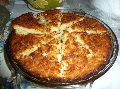 Coconut Custard Pie
This makes its own crust
2 cups milk 
2 1/2 cups flaked coconut 
4 eggs beaten
1 teaspoon vanilla extract 
3/4 cup all-purpose flour or bisquick
3/4 cup white sugar 
2 tablespoons margarine or butter softened 

Combine all ingredients mix well and pour into 9 inch buttered pie pan.
Bake at 350° for 50 to 60 minutes or until golden brown and knife inserted in the center comes out clean..

It’s like magic it layers into crust, custard and coconut topping. And so good!!!