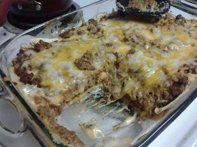 Creamy burrito casserole 
1 lb ground beef or 1 lb ground turkey
1/2 medium yellow onion, chopped
1 (1 1/4 ounce) package taco seasoning
6 large flour tortillas
1 (16 ounce) can refried beans
2 -3 cups shredded taco cheese or 2 -3 cups cheddar cheese
1 (10 3/4 ounce) can cream of mushroom soup
4 ounces sour cream
jarred hot sauce, if desired to spice it up
Directions:

Brown ground meat/turkey and onion; drain.
Add taco seasoning and stir in refried beans.
Mix soup and sour cream in a separate bowl.
Spread 1/2 sour cream mixture in the bottom of a casserole dish.
Tear up 3 tortillas and spread over sour cream mixture.
Put 1/2 the meat bean mixture over that.
Add a layer of cheese.
You could put some hot sauce on this now.
Repeat the layers.
Sprinkle cheese over the top and bake, uncovered, at 350°F for 20-30 minutes.