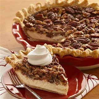 ~ EASY VANILLA CHEESECAKE PECAN PIE ~

1 refrigerated pie crust, (from 14.1-ounce package)
1 package (8 ounces) cream cheese, softened
3 eggs, divided
3/4 cup sugar, divided
4 teaspoons Pure Vanilla Extract , divided
1/2 cup light corn syrup
3 tablespoons butter, melted
1/4 teaspoon salt
2 cups pecan pieces, toasted

Preheat oven to 350°F. Prepare crust as directed on package for one-crust pie using 9-inch deep dish pie plate. Beat cream cheese, 1 of the eggs, 1/4 cup of the sugar and 2 teaspoons of the vanilla in large bowl with electric mixer on medium speed until well blended and smooth. Spread evenly on bottom of crust. Bake 15 minutes.

Beat remaining 2 eggs and 1/2 cup sugar in large bowl with wire whisk until smooth. Add corn syrup, butter, remaining 2 teaspoons vanilla and salt; stir until well blended. Sprinkle pecans evenly over baked cream cheese layer. Slowly pour corn syrup mixture over nuts. Bake 35 to 40 minutes or until just set in center. Cool completely on wire rack.