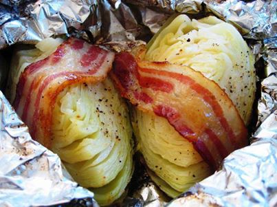 GRILLED CABBAGE (MY FAVORITE)
 Ingredients:

 1 head cabbage 
 4 teaspoons butter 
 4 slices bacon 

 Spice mix
 1 teaspoon salt 
 1/2 teaspoon garlic powder 
 1/4 teaspoon pepper 
 2 tablespoons grated parmesan cheese 


 Directions:
Cut cabbage into four wedges.
Place each wedge on a piece of doubled heavy-duty aluminum foil.
Spread cut sides with butter.
Mix spices together in a small container and sprinkle all of the mixture equally over each wedge.
Wrap bacon around each wedge.
Fold foil around cabbage, sealing each wedge tightly.
Grill cabbage, covered, over medium heat for 40 minutes or until the cabbage is tender, turning twice.
Be sure to click share, like or tag yourself in order to save this recipe for yourself!