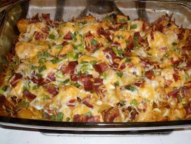 Dinner Idea for tonight and every night !!


Loaded Potato and Buffalo Chicken Casserole:

2 pounds boneless chicken breasts, cubed (1")
8-10 medium potatoes, cut in 1/2" cubes
1/3 cup olive oil
1&1/2 tsp salt
1 Tbsp. black pepper
1 Tbsp. paprika
2 Tbsp. garlic powder
6 Tbsp. hot sauce

Topping:
2 cups fiesta blend cheese
1 cup crumbled bacon
1 cup diced green onion

Preheat oven to 500 degrees. Spray a 9X13" baking dish with cooking spray. In a large bowl mix together the olive oil, salt, pepper, paprika, garlic powder and hot sauce. Add the cubed potatoes and stir to coat. Carefully scoop the potatoes into the prepared baking dish, leaving behind as much of the olive oil/hot sauce mixture as possible. Bake the potatoes for 45-50 minutes, stirring every 10-15 minutes, until cooked through and crispy and browned on the outside. While the potatoes are cooking, add the cubed chicken to the bowl with the left over olive oil/hot sauce mixture and stir to coat. Once the potatoes are fully cooked, remove from the oven and lower the oven temperature to 400 degrees. Top the cooked potatoes with the raw marinated chicken. In a bowl ix together the cheese, bacon and green onion and top the raw chicken with the cheese mixture. Return the casserole to the oven and bake for 15 minutes or until chicken is cooked through and the topping is bubbly delicious.
Serve with extra hot sauce and/or ranch dressing.