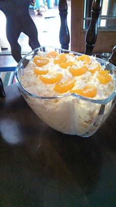 MANDARIN ORANGE SALAD!! My family's favorite side dish!!

Ingredients:
1 pkg Vanilla Instant Pudding Mix (use dry) I would use sugar free
1 Large can Crushed Pineapple (undrained)
2 Medium/Large cans Mandarin Oranges (drained)
1 pkg Cool Whip 8 oz ( and you could use fat free)

Directions:
Mix together Cool Whip and Instant vanilla pudding (do NOT make the pudding, just use it dry). Add undrained crushed pineapple and both cans of drained Mandarin Oranges. (Use as many mandarins as you like, more/less) Save a few mandarin oranges to decorate the top of salad. Refrigerate until it thickens again maybe a couple of hours before you need to use it.

Use as a side dish with a meal or serve with ice cream as a dessert!

You can make this healthier by choosing low/no sugar instant pudding mix and cool whip, and fresh mandarins. I particularly like the whipped cool whip for my salad as per the original. Try it a few times to see what suits you best. YUMMY!!
http://on.fb.me/105vxRK