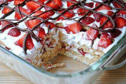 Please *SHARE* this so you can *SAVE* the recipe to your page!
This looks soooooo good!!!

No Bake Strawberry Icebox Cake

ingredients:
3 lbs. fresh strawberries, sliced 2 (8 oz.) tubs fat-free whipped topping (or use regular or light) 1 (14.4 oz.) box graham crackers 1/4 cup milk chocolate chip morsels

directions:

1. Spread a small amount of whipped topping on the bottom of a 9x13-inch baking pan. Place 5 graham cracker sheets down the middle and break 2 more sheets into crackers to fit down the sides. Lightly cover the top of the graham crackers with more whipped topping and then a layer of sliced strawberries. Repeat three times, until you have four layers of graham crackers (you may be a few crackers short on the top layer, but that's ok). You'll end with a layer of strawberries on top.

2. Place milk chocolate chip morsels in a plastic bag. Microwave in 10 second intervals until melted. Snip the end of the plastic bag and drizzle chocolate over top of cake.

3. Refrigerate covered for at least four hours, or until the crackers have softened completely. Cake will last well for two days. It will still be good on the third day, but the strawberries will start to get juicy and leak into the whipped topping. It will still taste good, but it won't be as pretty.

Join us here for more every day fun, tips, recipes, weight loss support & motivation @[216423811834252:69:Getting Fit with David & Bonnie]
Friend REquest me @[100000539695850:2048:Bonnie Pierce Luper]
