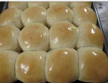 Here's a recipe for one hour yeast rolls. I make these rolls all the time and my family loves them. You would think they came from a restaurant. My daughter's boyfriend calls them doughnut biscuits, lol! 

ONE HOUR YEAST ROLLS

1 cup of warm water 
1/4 cup sugar
1/3 cup oil
2 tablespoons yeast
1 teaspoon salt
1 egg, beaten
3 1/3 cup flour

1.) In a large bowl, mix together warm water, sugar, oil and yeast. Let stand for 15 minutes until yeast mixture is bubbly.

2.) Stir in salt and beaten egg to yeast mixture.

3.) Gradually add flour. Dough will be kind of sticky, but add enough flour until it's manageable. Let dough rest in the bowl for 10 minutes. I cover mine with a towel. This allows the dough to rise more.

4.) Spray hands with non-stick cooking spray (such as Pam) and form dough into balls. Place balls so they don't touch on cookie sheet. Let rise for 20 more minutes. 

5.) Bake in 375 degree oven for 10 minutes.

6.) Mix 2-3 tablespoons of melted butter with honey (to taste) and brush the top of hot rolls with the honey butter.

7.) Enjoy!

󾁅ℓσтυѕ󾁅