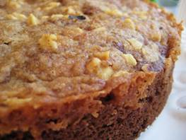 I can remember my Mom making her recipe for applesauce cakes when I was little and how wonderful the house would smell while they were baking in the oven. She would put all the right spices in and you could smell the cinnamon and nutmeg and it was one of the best cakes she baked.  I can remember how moist it was and she would serve it warm with a scoop of vanilla ice cream.  

Old Fashioned Apple Sauce Cake

1 and 1/2 cups all purpose flour 
1 teaspoon baking soda
2 teaspoons cinnamon
1/2 teaspoon allspice
3/4 cup light brown sugar, packed 
1/2 cup butter, melted 
3/4 cup applesauce
1/4 cup sour cream
1 teaspoon pure vanilla
1 large egg

STREUSEL

1/4 all purpose flour
1/4 cup brown sugar
1/4 cup granulated sugar
1/4 teaspoon cinnamon
1/8 teaspoon fresh grated nutmeg 
4 tablespoons cold butter
1/4 cup pecans, chopped 

Preheat oven to 350 degrees. Spray an 8 x 8 inch square baking pan with non stick cooking spray.  I also use parchment paper cut to fit the pan.  You can also use a 
9 inch round springform pan for a prettier presentation.

In a medium mixing bowl, thoroughly stir together flour, soda, cinnamon, allspice and brown sugar; set aside. In a large bowl, mix melted butter, applesauce, sour cream, vanilla and egg. Add the dry ingredients to the liquid ingredients and stir until mixed. Pour into pan.

Make streusel. In a mixing bowl, mix together all dry ingredients then cut in butter.  Sprinkle over top of cake.  Sprinkle nuts over top of streusel. 

Bake for 40-45 minutes or until golden brown around edges. Cool slightly. If using a spring form pan just remove sides of pan and cut into triangles.  If using an 8 x 8 pan, just slice from the pan in squares.

Recipe adapted from www.food.com