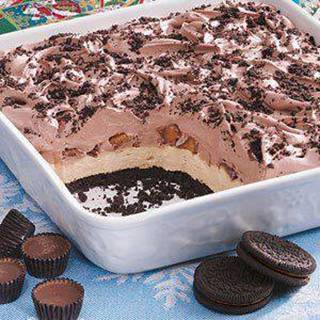 This is so sinful, I'll probably go to hell for posting it.. but OMG..I'd repent for a bite of this!! 

Oreo Peanut Butter Cup No Bake Dessert..

Ingredients
20 chocolate cream-filled chocolate sandwich cookies, divided
2 tablespoons butter, softened
1 package (8 ounces) cream cheese, softened
1/2 cup peanut butter
1-1/2 cups confectioners' sugar, divided
1 carton (16 ounces) frozen whipped topping, thawed, divided
15 miniature peanut butter cups, chopped
1 cup cold milk
1 package (3.9 ounces) instant chocolate fudge pudding mix

Directions
Crush 16 cookies; toss with the butter. Press into an ungreased 9-in. square dish; set aside.
In a large bowl, beat the cream cheese, peanut butter and 1 cup confectioners' sugar until smooth. Fold in half of the whipped topping. Spread over crust. Sprinkle with peanut butter cups.
In another large bowl, beat the milk, pudding mix and remaining confectioners' sugar on low speed for 2 minutes Let stand for 2 minutes or until soft-set. Fold in remaining whipped topping.
Spread over peanut butter cups. Crush remaining cookies; sprinkle over the top. Cover and chill for at least 3 hours.

Join us here for more every day fun, tips, healthy recipes, weight loss support & motivation http://www.facebook.com/groups/DarsJourneyToANewYou

FOLLOW ME ON FACEBOOK -
I am always posting awesome stuff! https://www.facebook.com/ddacuk66

Get info here about skinny fiber, an amazing weight loss product taking the market by storm: http://designyourbody.sbc90.com/