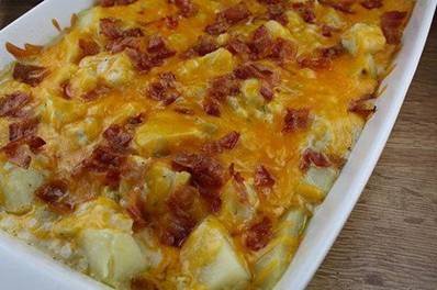 POTATOES ON A RANCH
The Ranch dressing, bacon, and cheese is an excellent flavor combination that your family and guests will love. You can control your finishing time a little bit by boiling the potatoes a little longer, but be careful so they don’t get to soft or overdone. Enjoy

10 medium potatoes (cut into ½” cubes)
1 can of condensed cream of mushroom soup
1 ½ cups milk
1 envelope dry ranch dressing mix
2 cups shredded cheddar cheese (divided)
Salt and pepper to taste
6 bacon slices (cooked until crispy and crumbled)

Pre-heat the oven to 350 degrees.
In a large pot cover the potatoes in water and bring to a boil over high heat. Cook for 10-12 minutes or until the potatoes are almost tender. Drain.
Grease a 13×9 inch casserole dish.

In a bowl, mix together cream of mushroom soup, milk, ranch dressing, 1 cup of the cheese, and add the salt and pepper to taste. Pour over potatoes in the casserole dish. Sprinkle remaining cup of shredded cheddar cheese and the crumbled bacon over the top.
Place into the oven and bake uncovered for 25-30 minutes or until the potatoes are tender.