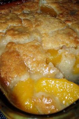 I am a cobbler junkie ...if there is such a thing! I love warm cobbler of any kind with cold vanilla ice cream! And not just any cobbler...it has to be a southern cobbler like my Mom used to make. Especially this peach cobbler. I keep a bag of frozen peaches in the freezer at all times just in case it hits me! This is one of the throw it all together and it comes out wonderful recipes.

Fresh peaches are always preferable, but canned work well. Either way, this dessert is a warm, flavorful treat for any time of year (and surefire hit at pot luck parties!)

Peach Cobbler

2 cups fresh sliced peaches (or one 29 ounce can of sliced peaches, drained)
1 cup Bisquick mix 
1 cup of milk
1/2 teaspoon nutmeg
1/2 teaspoon cinnamon
1/2 cup butter, melted
1 cup of sugar
Preheat oven to 375 degrees Fahrenheit

In an 8 x 8 baking dish, stir Bisquick mix, milk, nutmeg and cinnamon together until thoroughly mixed. Stir in melted butter until crust is fully moistened. In a medium mixing bowl, stir sugar and peaches. Spoon peaches over the cobbler crust.

Bake for one hour or until crust is a golden brown. Serve warm and enjoy!