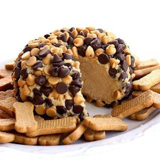 Peanut Butter “Cheese Ball”
 Ingredients:
 1 package (8 ounces) cream cheese, at room temperature
 1 cup powdered sugar
 3/4 cup creamy peanut butter (not all-natural)
 3 tablespoons packed brown sugar
 3/4 cup milk chocolate chips
 3/4 cup peanut butter chips
 Graham cracker sticks, teddy grahams, and/or apple slices for dipping
 
Instructions:
 Beat cream cheese, powdered sugar, peanut butter and brown sugar in large mixer bowl until blended.
 Spoon onto a large piece of plastic wrap; bring up all four corners and twist tightly forming into a ball shape.
 Freeze for 1 hour 30 minutes or until firm enough to keep its shape. Place peanut butter and chocolate chips in flat dish. Remove plastic wrap from ball and roll ball 
into morsels to completely cover, pressing morsels into the ball if necessary.
 Place ball on serving dish; cover and freeze for 2 hours or until almost firm. (Can be made ahead. If frozen overnight, thaw at room temperature for 20 to 30 minutes before serving.) Serve with graham cracker sticks, teddy grahams, or apple slices for dipping or spreading.

recipe from www.the-girl-who-ate-everything.com