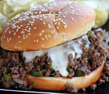 Philly Cheese steak Sloppy Joes
1 lb ground beef
1 small sweet onion chopped
1 green bell pepper seeded and chopped
1/4 cup steak sauce (like A1)
1 cup beef broth
provolone cheese
buns


Crumble the ground beef into a skillet and add the chopped onion and pepper. Begin to cook, when the beef is about half cooked, add the broth and steak sauce. Cook until all items are done and allow to simmer and cook down/thicken.
I used hoggie buns from the bakery. Slice them open and filled 6 with the meat mixture. Then each was topped with a slice of provolone cheese. This was placed under the broiler for 3 minutes.