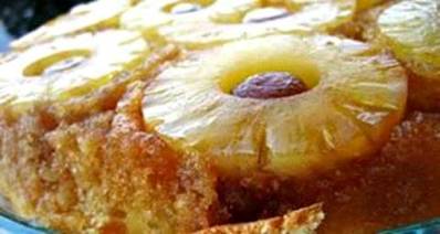 Pineapple Upside-Down Cake 

Ingredients
 1/4 cup butter, softened
 1/2 cup packed brown sugar
 1 can sliced pineapples drained
 6 cherries, pitted 
 1/3 cup shortening
 1/2 cup white sugar
 1 egg
 1 1/4 cups cake flour
 1 1/2 teaspoons baking powder
 1/2 teaspoon salt
 1/2 teaspoon orange zest
 1/2 cup orange juice

Directions

Spread butter or margarine in bottom of 8 inch round baking dish. Sprinkle with brown sugar and arrange very well drained pineapples and  cherries on top.
In a large bowl, cream shortening and sugar together thoroughly. Blend in unbeaten egg, and beat well.
In a separate bowl, sift together flour, baking powder and salt. Add these dry ingredients to creamed mixture alternately with the juice. Stir in orange rind until evenly distributed.
Bake at 350 degrees F (175 degrees C) for 45 to 50 minutes, or until cake is done. Allow cake to cool 5 to 10 minutes in the pan. Invert over serving plate to remove cake, and allow syrup to drain a minute. Adopted from All Recipes.com