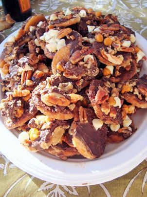 It's Game Day so we have to throw in a great snack recipe! Yummy Ritz Cracker Candy! You're gonna want to 
**SHARE THIS TO YOUR OWN PAGE TO SAVE IT!** 

Ritz Cracker Candy 

You will Need: 

1 to 2 sleeves of Ritz crackers
1 1/2 cup unsalted butter
1 1/2 cup firmly packed brown sugar
1/2 cup chocolate chips
1/2 cup chopped pecans
1/2 cup peanut butter chips/white chocolate chips 
Preheat oven to 350 degrees. Line a baking sheet with aluminum foil or parchment paper and arrange the crackers on it in a single layer. 

Melt butter and brown sugar together in a sauce pan over medium-low heat. After it's melted, increase heat to medium-high and boil for 3 minutes, stirring constantly. Pour this mixture over the cracker layer. 

Bake for 5 minutes and remove from oven. Sprinkle crackers with chocolate chips and place back in the oven for 3 minutes (the oven will be turned off but still warm). Spread the melted chocolate over crackers and top with pecans and remaining chips. Allow to cool completely and break apart to serve. 
http://www.southernbellesimple.com/search?q=Ritz+cracker+candy