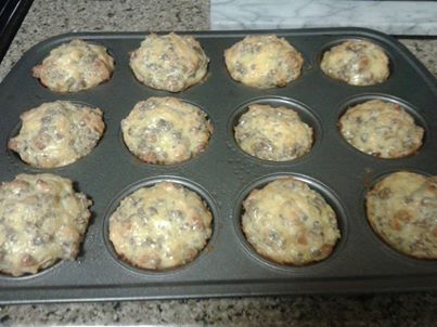 Sausage Muffins! 1 cup of Bisquick, 1 lb cooked sausage, 4 eggs beaten, & 1 cup of shredded Cheddar cheese. 350 degrees 20 minutes.  YUM! Great for a cold night!