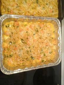 This recipe comes from C&R Seafood, they are Louisiana shrimpers who make their home in Hammond Louisiana. They have been shrimping the Louisiana waters for 17 years. I hope you enjoy!

Shrimp Fettuccine Bake
1 package of fettuccine noodles 16oz.
1 cup of diced onions
1/4 cup celery
1/2 cup diced green bell pepper
3 Tablespoons flour
1 Tablespoon minced garlic
1-2 Tablespoons of parsley flakes
1/2 teaspoon of Cajun Seasoning
1 lb. peeled shrimp
3/4 cup half and half
1 lb. Velveeta Mexican style cheese, cubed
2 Tablespoons parmesan cheese

Cook fettuccine as directed. Drain and rinse well. Set aside. Butter or spray a 2 quart casserole dish and set aside. Meanwhile, in a large skillet over medium heat, melt the butter, add the chopped onion, celery, and bell pepper and cook until softened. Stir in the flour and cook for 3 minutes. Add the garlic and cook another 2 minutes. Add the parsley, Cajun seasoning, and shrimp, cook on low for about 30 minutes. Add the half and half and cubed Velveeta and continue to cook over low until the cheese is melted. Add the fettuccine and stir well to combine. Transfer to the prepared dish and sprinkle with a light covering of parmesan cheese. Bake uncovered at 350 degrees for 20-30 minutes, or until bubbly.