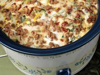 Slow Cooker Sausage Breakfast Casserole

1 pkg. (26-32 ounces) frozen shredded hash brown potatoes
1 pkg. Jimmy Dean® Hearty Original Sausage Crumbles
2 cup (8 ounces) shredded mozzarella cheese
1/2 cup (2 ounces) shredded Parmesan cheese
1/2 cup julienne cut sun dried tomatoes packed in oil, drained
6 green onions, sliced
12 eggs
1/2 cups milk
1/2 teaspoon salt
1/4 teaspoon ground black pepper
Directions
1. Spray a 6 quart slow cooker with cooking spray. Layer 1/2 of the potatoes on the bottom of slow cooker.

2. Top with half of the sausage, mozzarella and Parmesan cheese, sun dried tomatoes and green onion. Repeat layering.

3. Beat eggs, milk salt and pepper in large bowl with a wire whisk until well blended.

4. Pour evenly over potato-sausage mixture.

5. Cook on low setting for 8 hours or on high setting for 4 hours or until eggs are set.

Notes
Substitute 1 cup chopped fresh tomato for sun dried tomatoes, if desired.

Substitute 1 pkg. Regular Flavor Jimmy Dean® Pork Sausage Roll, cooked, crumbled for Jimmy Dean® Hearty Original Sausage Crumbles.