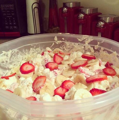 Recipe for Strawberry-Banana Cheesecake Salad

Stir together:

1 bag of miniature marshmallows
16 oz of vanilla yogurt
1 regular size tub of cool whip
1 package of nobake cheese cake filling

Stir in 
1-2 containers of sliced up strawberries
3-4 sliced up bananas

Other fruits can be substituted or added as desired

Best served chilled and same day due to nanner discoloration lol