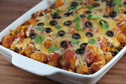 Here's another great recipe for football season!


TATOR TOT TACO BAKE
1 lb ground beef
 1 small onion (diced)
 1 garlic clove (minced)
 1 small can black olives (sliced)
 1 (1 ounce) package taco seasoning mix
 1 (16 ounce) bag frozen corn
 1 (4 ounce) can green chilies (diced and drained)
 1 (12 ounce) can black beans (drained and rinsed)
 1 (16 ounce) bag shredded Mexican cheese blend
 1 (16 ounce) package frozen tater tots
 1 (10.5 ounce fluid ounce) can enchilada sauce
 
Preheat the oven to 375 degrees. Spray a 9×13 inch baking dish with cooking spray. Heat a skillet to medium high heat. Add ground beef, garlic, and onion and cook while breaking the meat apart with a spoon or spatula until the ground beef is completely browned. Drain off any excess fat. Add taco seasoning mix, green chilies, frozen corn, and black beans to the ground beef. Cook until heated through.
 
In a large bowl combine ground beef mixture, ¾ of the Mexican cheese blend, and all of the tater tots. Stir well to combine.
 Pour about 1/3 of the enchilada sauce into the bottom of the prepared baking dish. Add the tater tot mixture to the baking dish and lightly pat the mixture down into a solid, even layer. Pour the remaining enchilada sauce over the tater tots.
 
Place into the oven and bake at 375 degrees for 40 minutes. During the last few minutes of baking, top the casserole with the remaining Mexican cheese blend and the sliced black olives. Return to the oven and bake until the cheese is melted and bubbly.

SHARE to save to your timeline!  
Friend me for great recipes at @[1512642100:2048:Cathy Bloodworth Hall]