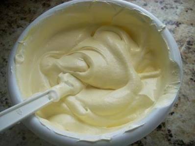 The best icing!! All you do is mix one vanilla pudding packet with half of the milk called for on the package. Whisk until it begins to thicken. Then fold in one container of Cool Whip. A great frosting spread on cakes and piped onto cupcakes, a tasty filling in crepes or on waffles along with some fruit...way less sugar too!!!!