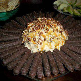 Turtle Cheese Cake Dip! OH MY!!!

Ingredients
8 oz of softened cream cheese
1/4 cup butter

1/2 tsp of vanilla extract
1 1/5 tablespoons brown sugar
1/3 icing sugar
1/2 cup chopped pecans
1/2 cup mini semisweet choc chips
1/2 pk vanilla pudding mix
1/2 cup caramel topping plus little more for drizzling

Directions
Cream soften cream cheese & butter.
Add caramel topping and beat well.
Cream in brown sugar & icing sugar.
Add vanilla & dry pudding mix.
Fold in choc chips & pecans.
Pat into a ball and refrigerate for one hour.
Place ball on serving platter, drizzle with caramel topping and serve with chocolate wafers, chocolate graham fingers, Nilla wafers or sliced apples